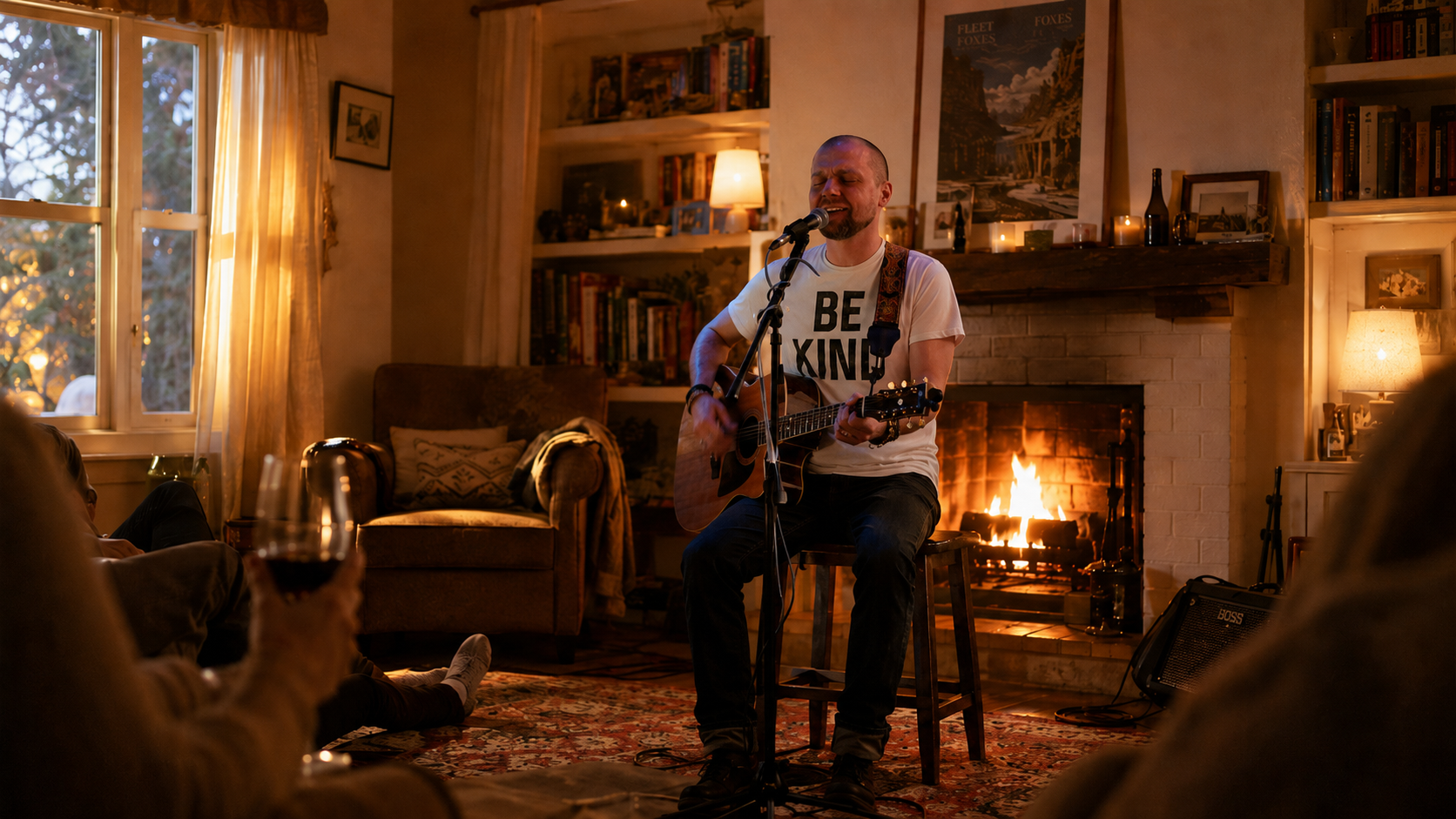 A warmly lit Florida living room set for a private acoustic Brad Floyd home concert — fireplace, candles, wine, an attentive audience